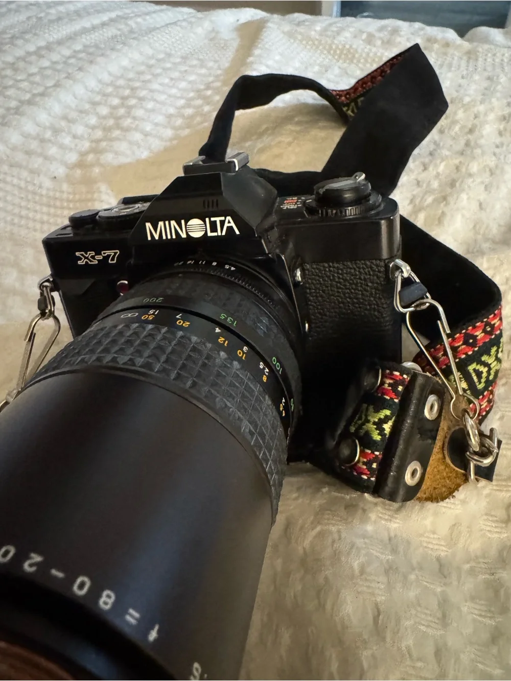 X-7 Minolta Black SLR Camera with Telephoto Lens